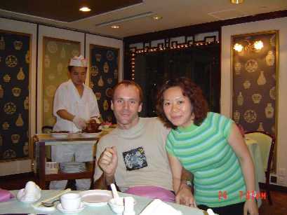 My wife Carol and I enjoying a very tasty dinner at a Peking Duck restaurant in Hong Kong.